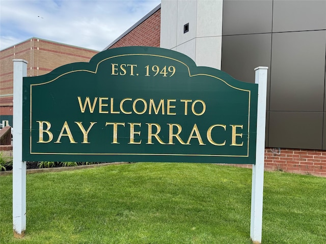 23-45 Bell Blvd Unit 4K, Bayside, NY 11360 - community sign featuring a lawn
