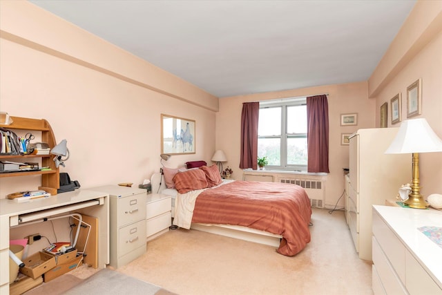 23-45 Bell Blvd Unit 4K, Bayside, NY 11360 - bedroom featuring radiator, light colored carpet, and an office area