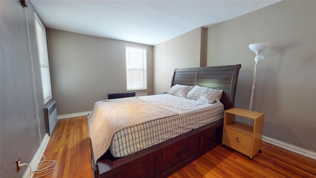 142-20 84th Dr Unit 3K, Briarwood, NY 11435 - bedroom with wood finished floors and baseboards
