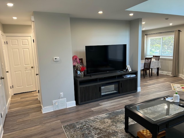 38 Tulip Ct, Nanuet, NY 10954 - living area with wood finished floors, baseboards, and recessed lighting
