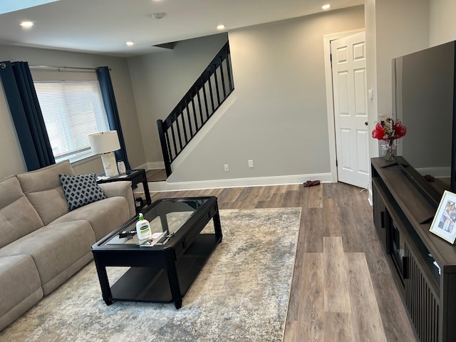 38 Tulip Ct, Nanuet, NY 10954 - living room with wood finished floors, stairs, recessed lighting, and baseboards