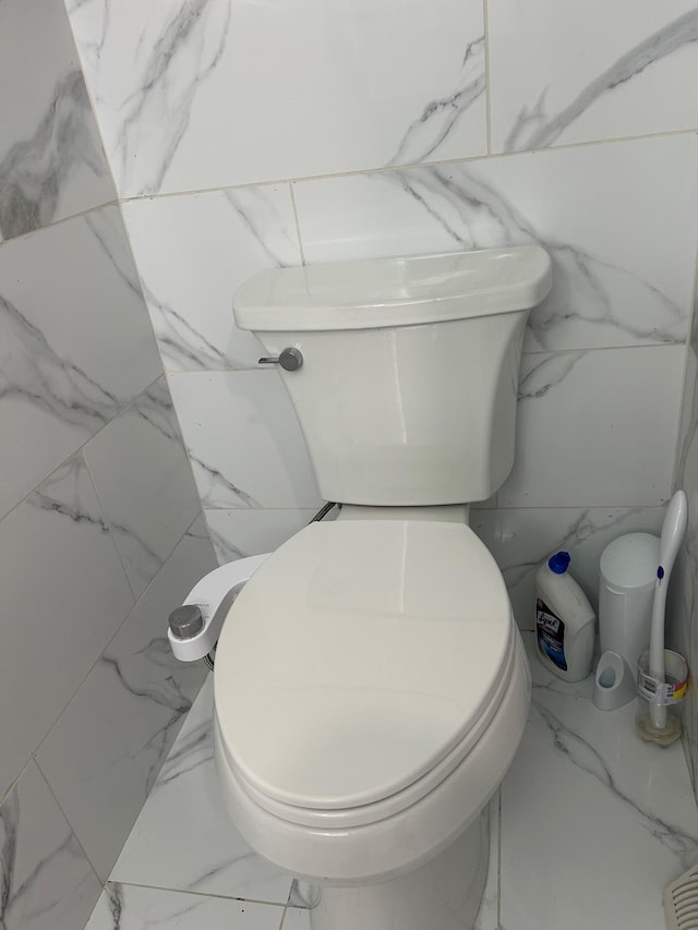 38 Tulip Ct, Nanuet, NY 10954 - bathroom with toilet and marble finish floors