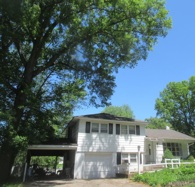10 Lori St, Poughkeepsie, NY 12603 - tri-level home with a garage and an attached carport