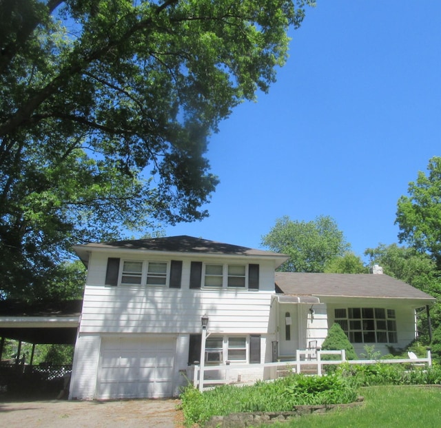 10 Lori St, Poughkeepsie, NY 12603 - split level home with a garage and a carport