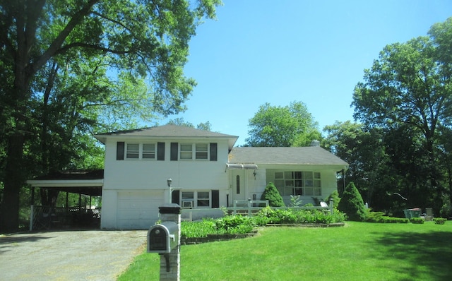 10 Lori St, Poughkeepsie, NY 12603 - split level home with driveway, a front lawn, a garage, and a carport