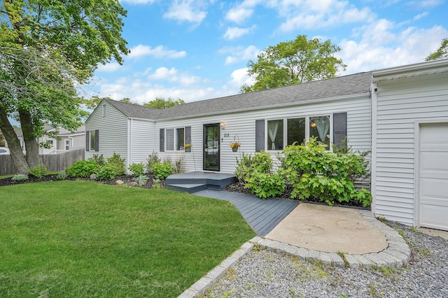 215 Lyman Rd, East Patchogue, NY 11772 - ranch-style home featuring roof with shingles