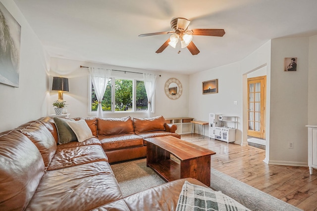 215 Lyman Rd, East Patchogue, NY 11772 - living room with wood-type flooring and ceiling fan