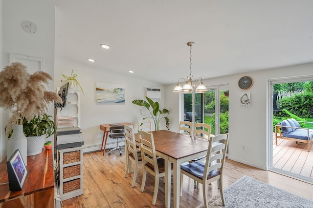 215 Lyman Rd, East Patchogue, NY 11772 - dining area featuring baseboard heating, light wood-style flooring, recessed lighting, and a wall unit AC
