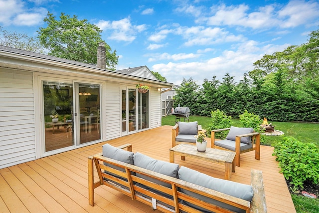 215 Lyman Rd, East Patchogue, NY 11772 - wooden deck featuring an outdoor living space