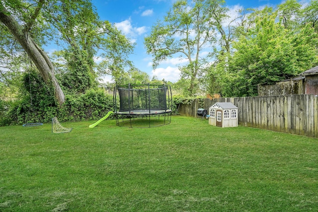 215 Lyman Rd, East Patchogue, NY 11772 - view of yard featuring a trampoline