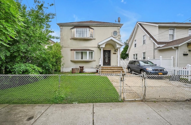 97-16 222nd St, Queens Village, NY 11429 - traditional-style home featuring a gate and stucco siding