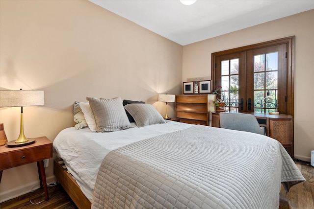 209 Onderdonk Ave, Ridgewood, NY 11385 - bedroom featuring french doors, wood finished floors, and baseboards