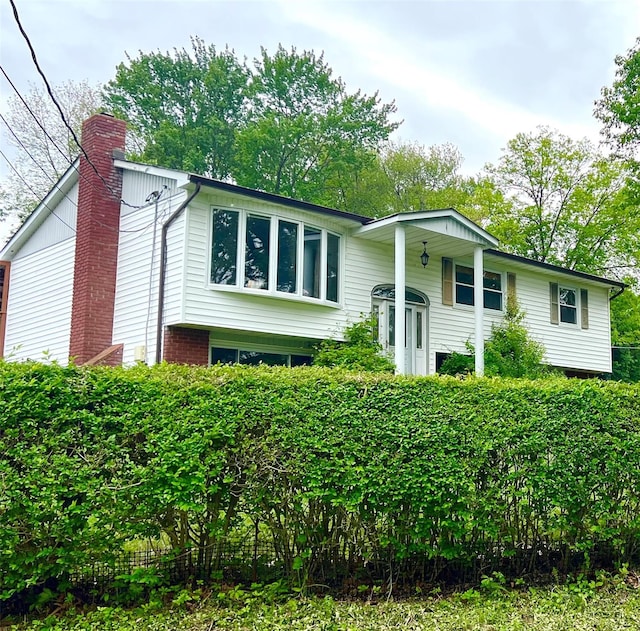 6 Pelham Dr, Carmel, NY 10512 - raised ranch with a chimney
