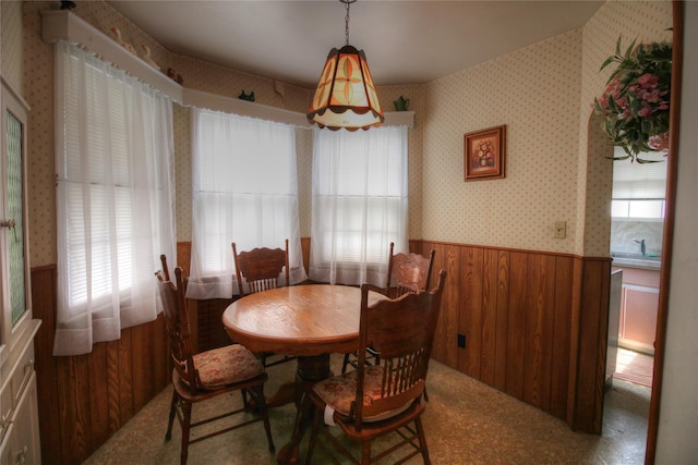 115-31 237th St, Elmont, NY 11003 - dining area featuring wallpapered walls, wainscoting, and wood walls