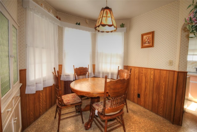115-31 237th St, Elmont, NY 11003 - dining space featuring wallpapered walls, wainscoting, and wood walls