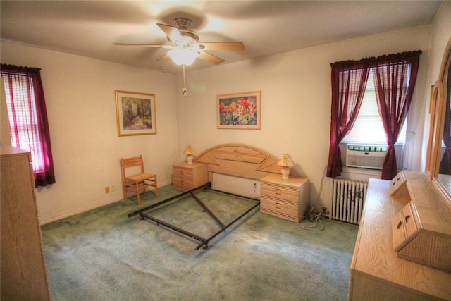 115-31 237th St, Elmont, NY 11003 - bedroom with radiator, cooling unit, carpet flooring, and ceiling fan