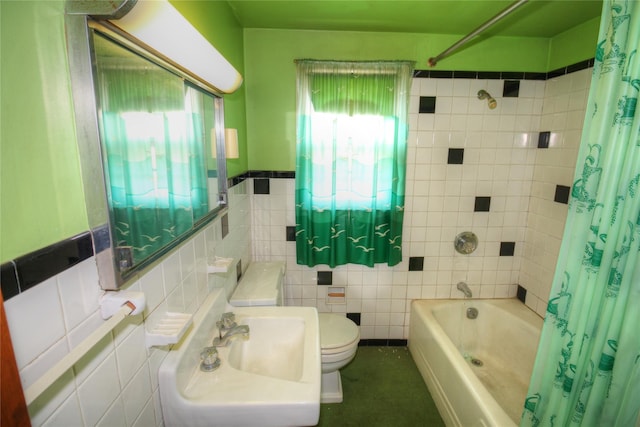 115-31 237th St, Elmont, NY 11003 - full bathroom featuring plenty of natural light, toilet, shower / tub combo, tile walls, and a sink