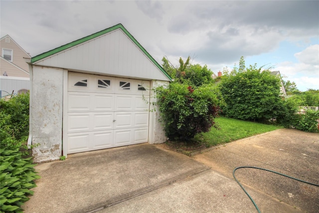115-31 237th St, Elmont, NY 11003 - detached garage featuring concrete driveway