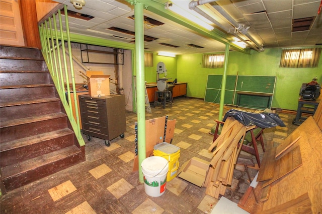 115-31 237th St, Elmont, NY 11003 - basement with tile patterned floors, stairs, and baseboards