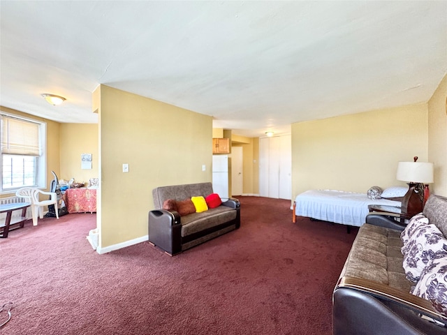86-16 60th Ave Unit 5K, Elmhurst, NY 11373 - carpeted living room featuring baseboards