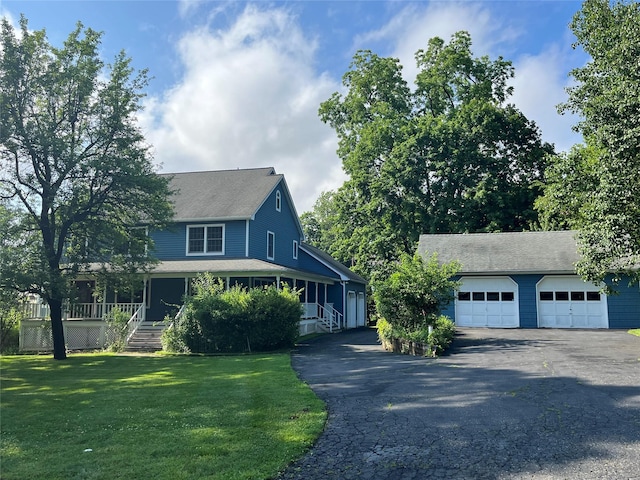 159 Martin Pl, Pearl River, NY 10965 - view of front of property featuring a garage, asphalt driveway, a front lawn, roof with shingles, and an outdoor structure