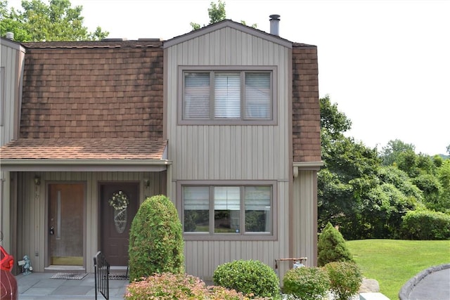 19 Maple Crest Dr, Peekskill, NY 10566 - view of front of home with roof with shingles and a front yard