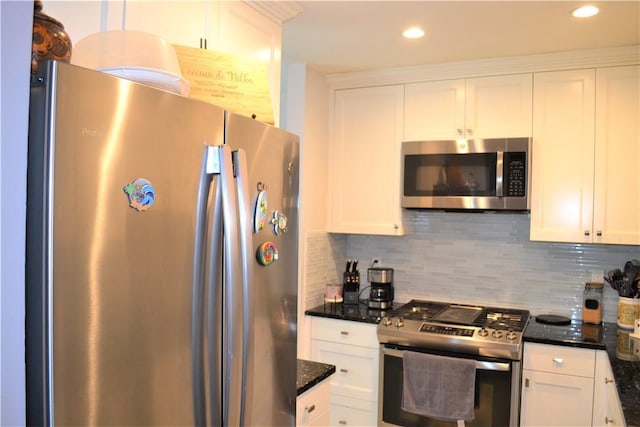19 Maple Crest Dr, Peekskill, NY 10566 - kitchen featuring stainless steel appliances, white cabinetry, decorative backsplash, dark stone counters, and recessed lighting