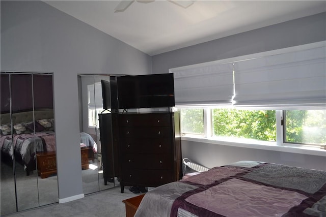 19 Maple Crest Dr, Peekskill, NY 10566 - carpeted bedroom featuring two closets, lofted ceiling, and a ceiling fan