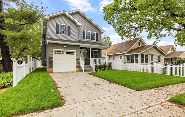 1850 Voshage St, Baldwin, NY 11510 - view of front of house featuring covered porch, an attached garage, concrete driveway, and stone siding
