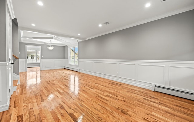 1850 Voshage St, Baldwin, NY 11510 - unfurnished living room featuring crown molding, light wood-style flooring, baseboard heating, recessed lighting, and wainscoting