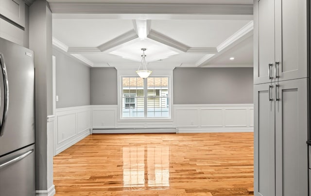 1850 Voshage St, Baldwin, NY 11510 - unfurnished dining area with a baseboard radiator, coffered ceiling, light wood-style flooring, crown molding, and beam ceiling