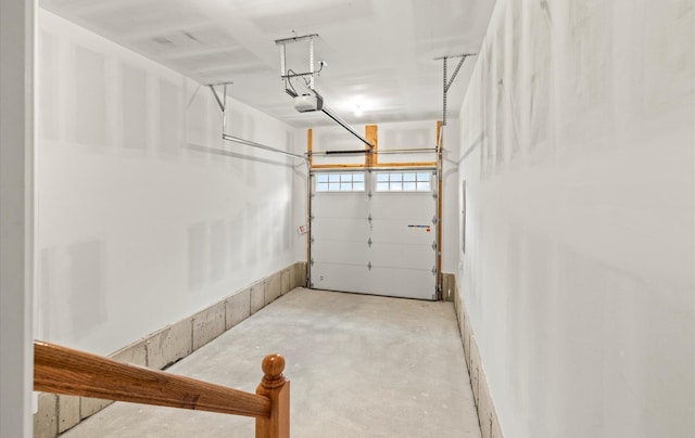 1850 Voshage St, Baldwin, NY 11510 - garage featuring a garage door opener