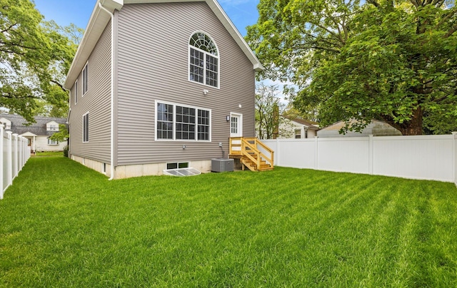 1850 Voshage St, Baldwin, NY 11510 - rear view of property with central AC