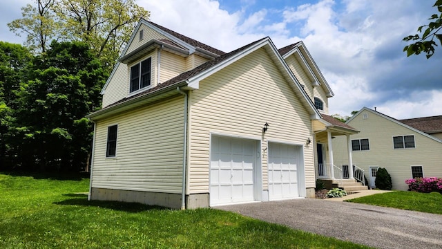 28 Hynard Pl, Baldwin Place, NY 10505 - view of side of home featuring driveway and a yard