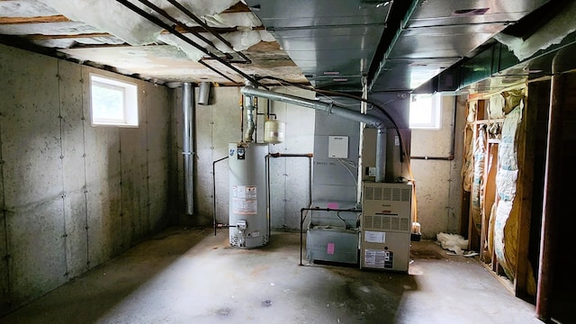 28 Hynard Pl, Baldwin Place, NY 10505 - below grade area featuring water heater and heating unit