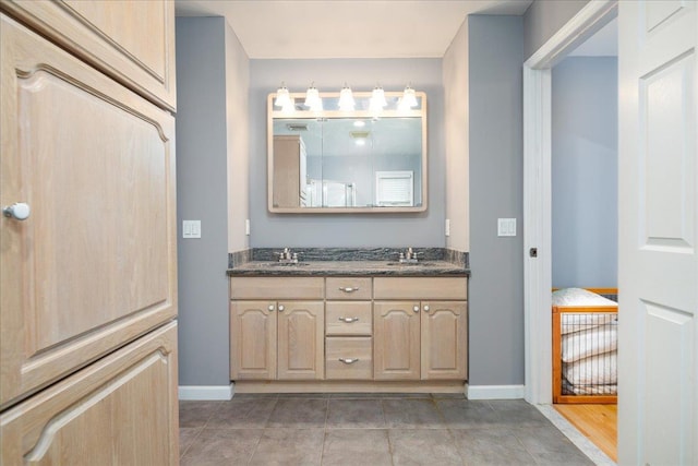 1360 Powell Ave, Merrick, NY 11566 - bathroom featuring double vanity and tile patterned flooring