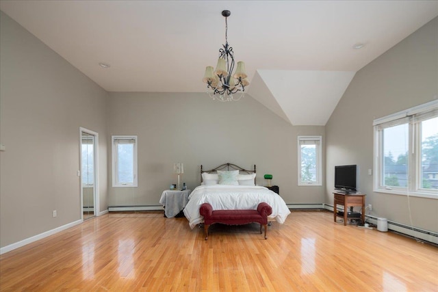 1360 Powell Ave, Merrick, NY 11566 - bedroom featuring a chandelier, light wood-style flooring, and a baseboard radiator