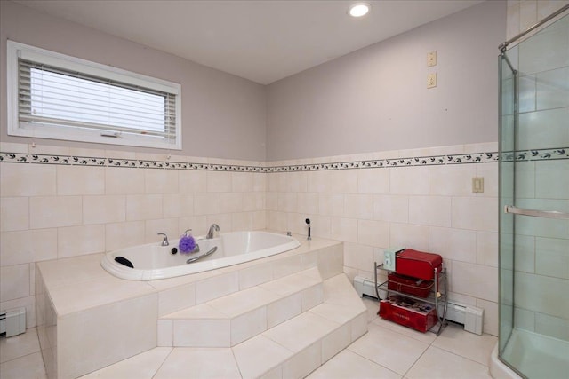 1360 Powell Ave, Merrick, NY 11566 - full bathroom featuring tile walls, tile patterned flooring, a garden tub, a stall shower, and a baseboard radiator