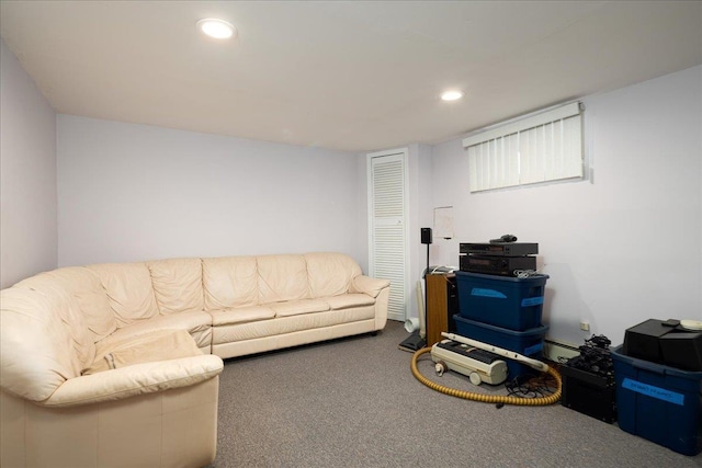 1360 Powell Ave, Merrick, NY 11566 - living area with carpet, recessed lighting, and a baseboard radiator