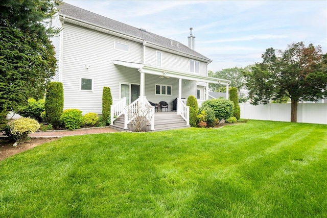 1360 Powell Ave, Merrick, NY 11566 - rear view of property with a chimney