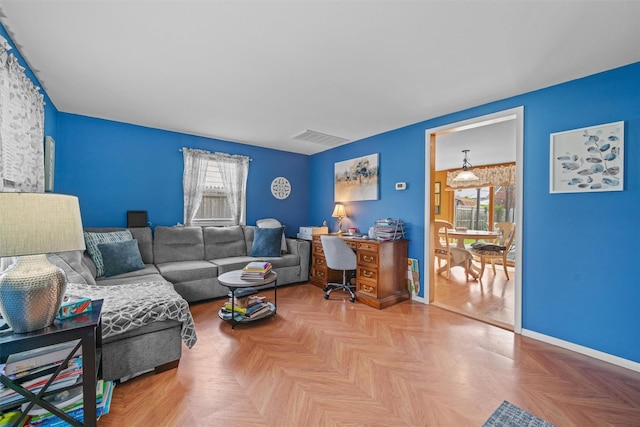 36 Peck St, Haverstraw, NY 10993 - living area featuring baseboards and an office area