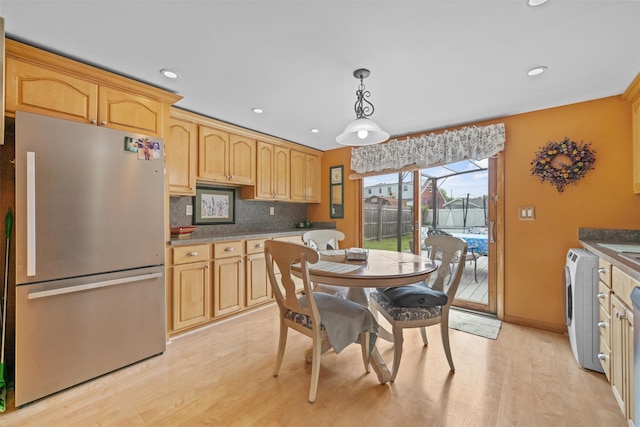 36 Peck St, Haverstraw, NY 10993 - kitchen with freestanding refrigerator, washer / clothes dryer, light wood-type flooring, backsplash, and recessed lighting