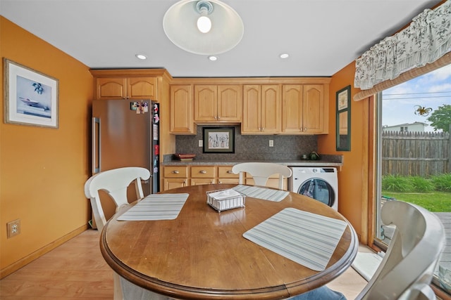 36 Peck St, Haverstraw, NY 10993 - dining space featuring washer / clothes dryer, light wood-type flooring, baseboards, and recessed lighting