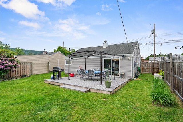 36 Peck St, Haverstraw, NY 10993 - back of property featuring a wooden deck, a pergola, and roof with shingles