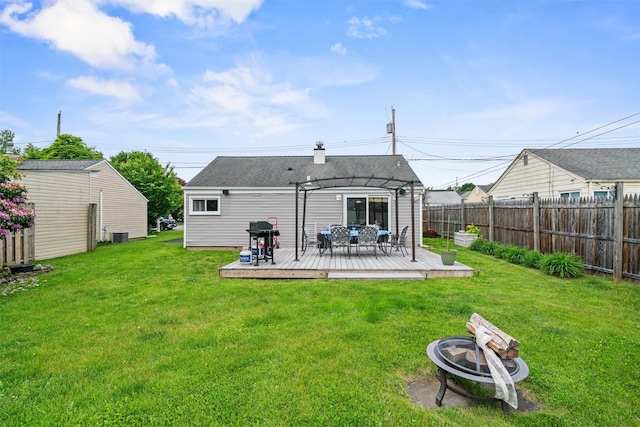 36 Peck St, Haverstraw, NY 10993 - back of house featuring a fire pit, a wooden deck, a pergola, and central AC