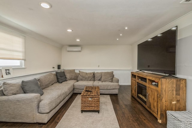64 W Granada Ave, Lindenhurst, NY 11757 - living room featuring an AC wall unit, dark wood-type flooring, and recessed lighting