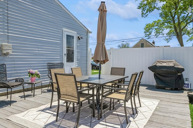 64 W Granada Ave, Lindenhurst, NY 11757 - wooden deck with outdoor dining space
