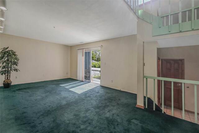35 Gibbs Rd Unit 39, Coram, NY 11727 - unfurnished living room with carpet flooring
