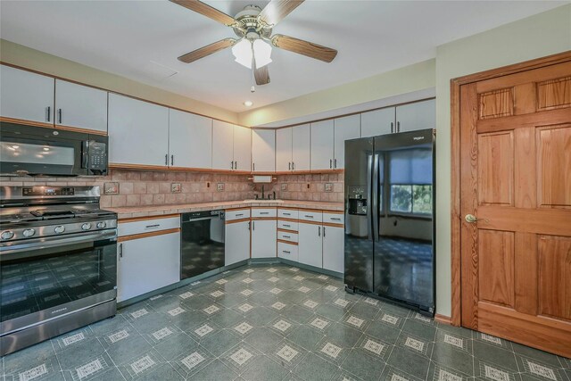35 Gibbs Rd Unit 39, Coram, NY 11727 - kitchen with black appliances, dark flooring, ceiling fan, tasteful backsplash, and white cabinetry