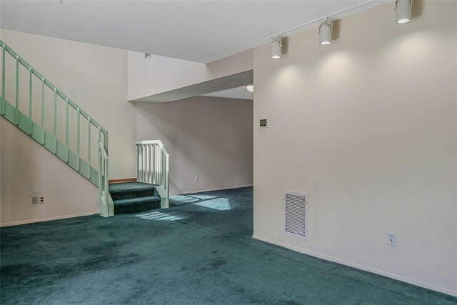 35 Gibbs Rd Unit 39, Coram, NY 11727 - unfurnished living room with carpet, stairway, track lighting, and baseboards